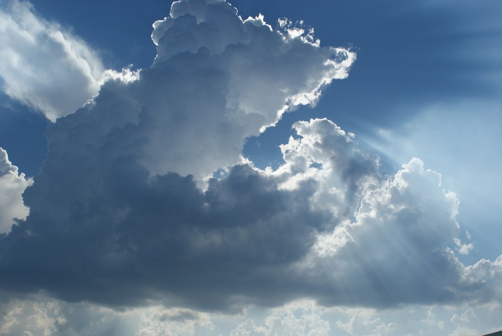 Clouds in the sky with sunlight streaming from behind them.