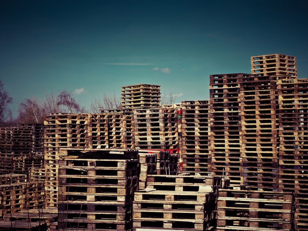Many stacks of pallets.