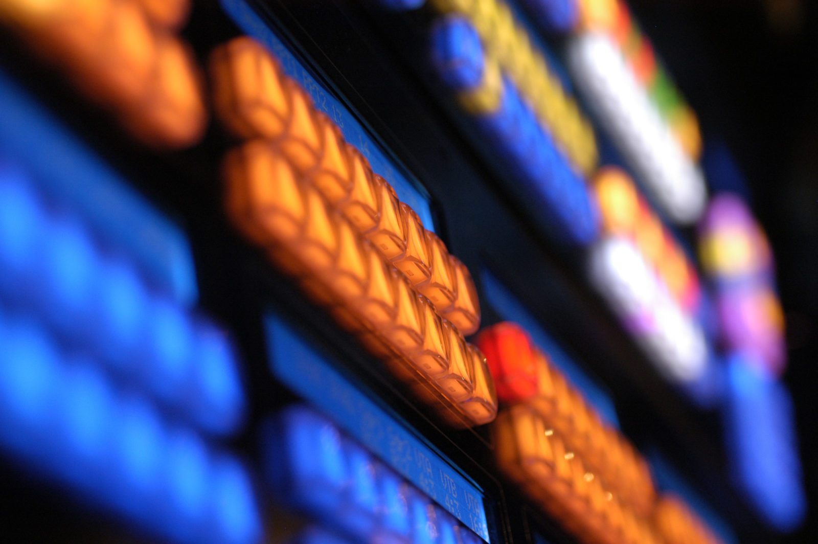 Glowing keys on a media console in a dark room (SHALLOW DOF)