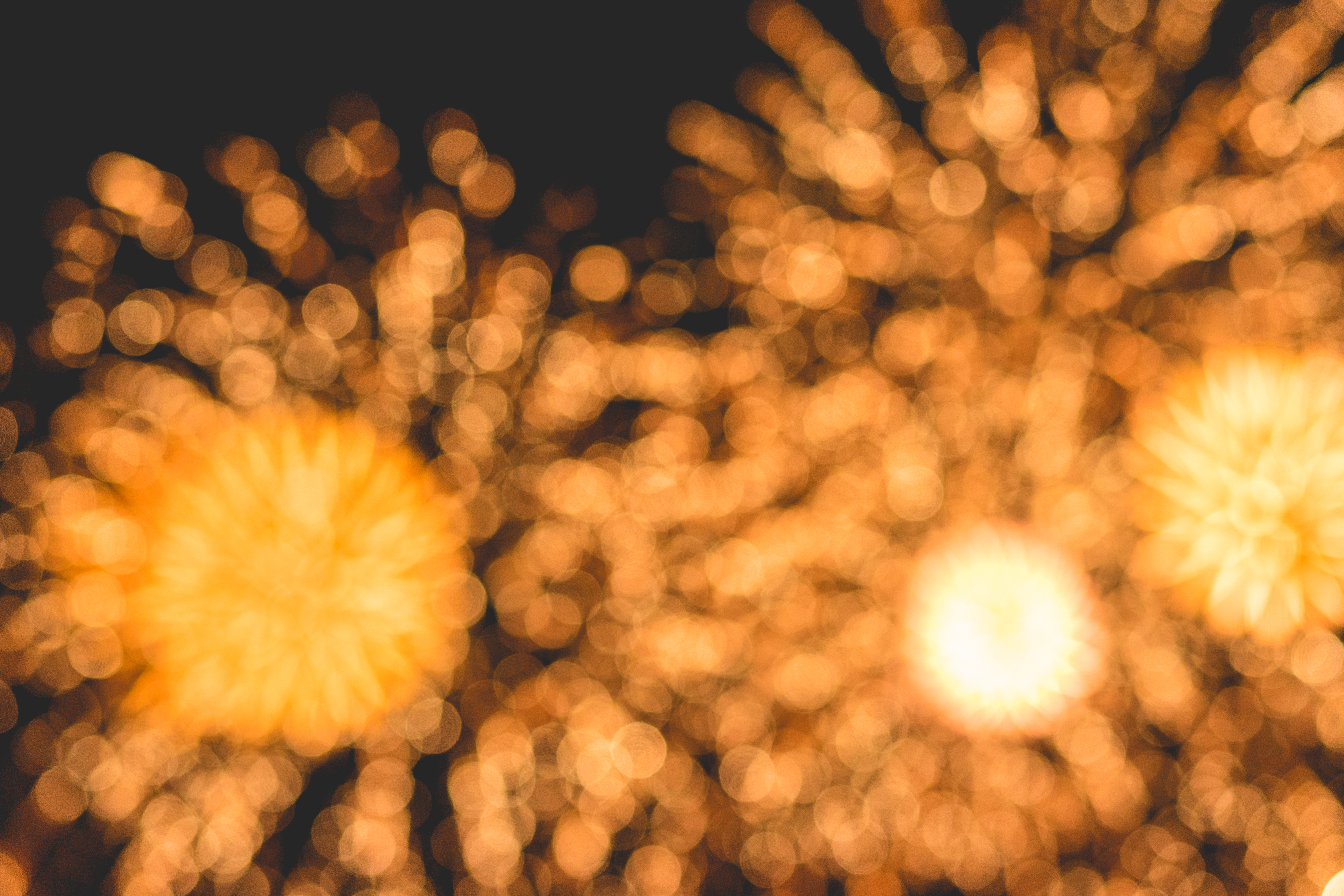Blurry, gold fireworks.