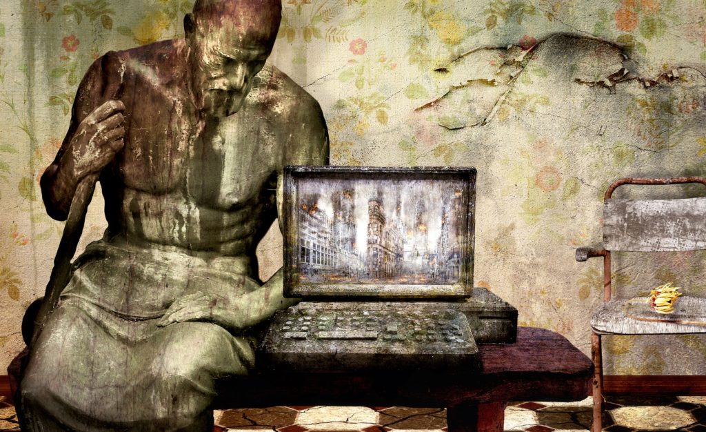 A painting of an old fashioned computer and a life size sculpture of a man on the desk next to it.