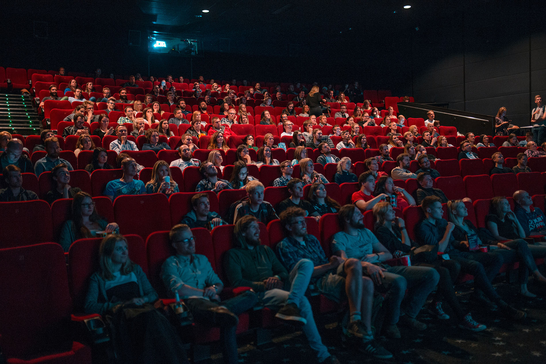 A full audience in a movie theatre.