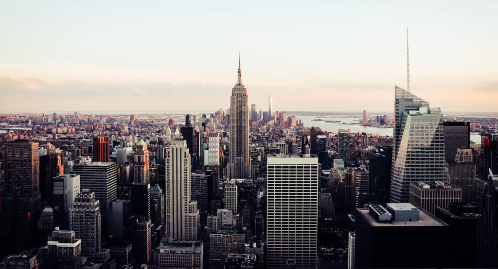 New York City with the Empire State building in the center.