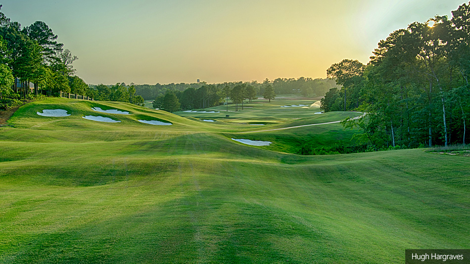 A beautiful green golf course in the early morning.