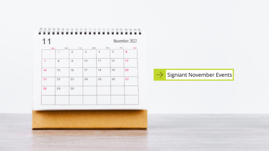 Signiant November Events calendar propped up on table with white background