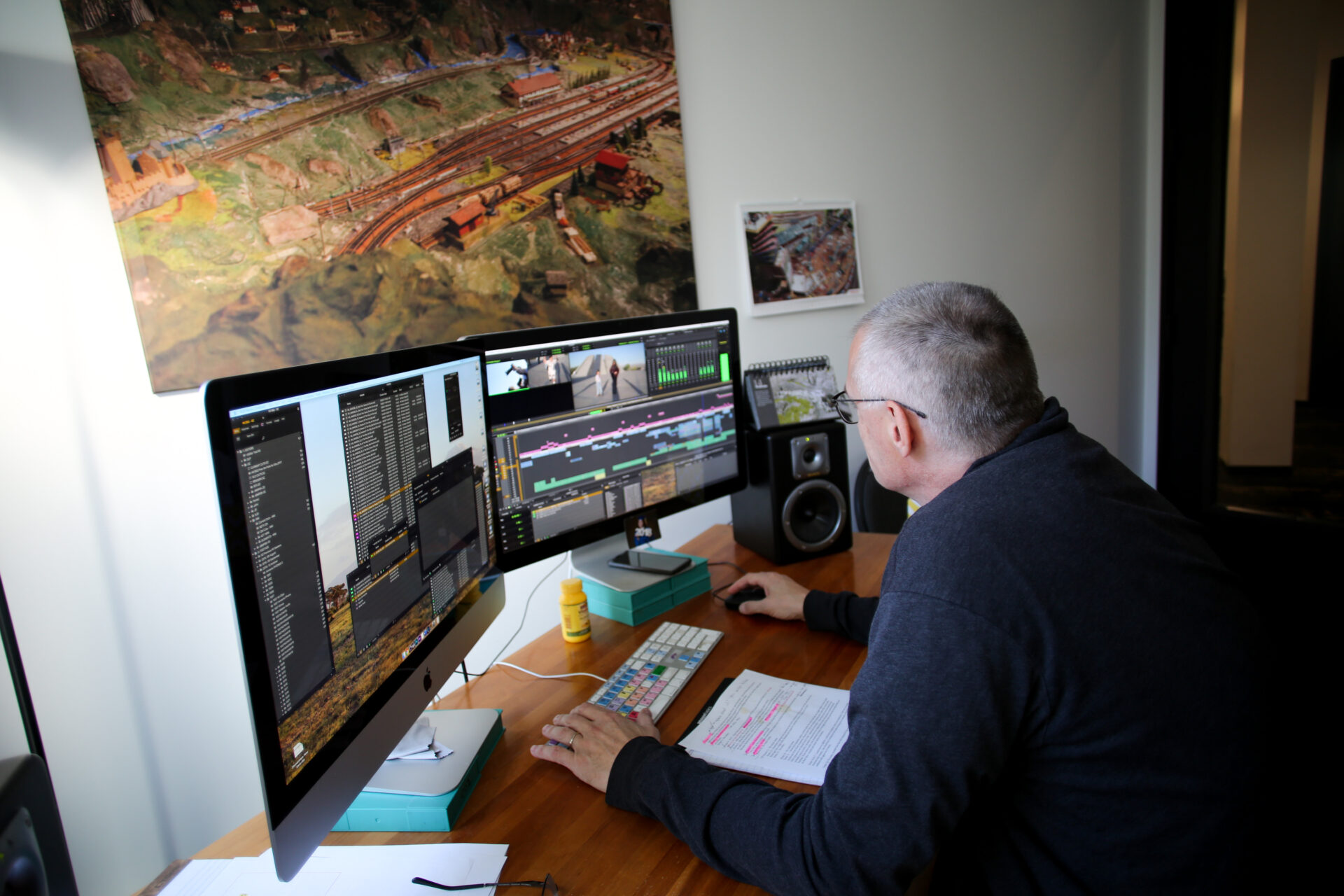 A picture of a man editing on his Media Composer edit computer.